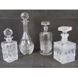 Four 20th century cut glass decanters wi