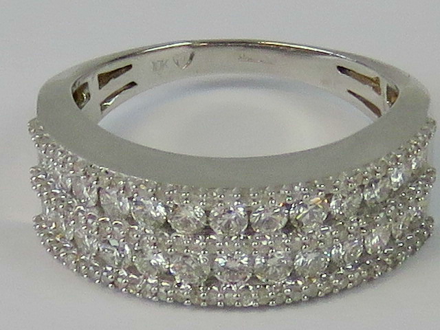 A 10ct white gold diamond encrusted half