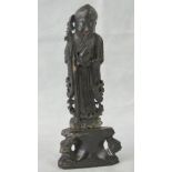 A soapstone carving of an oriental deity