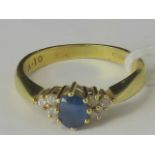 An 18ct gold sapphire and diamond ring,