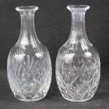 A pair of heavy cut glass decanters, sto