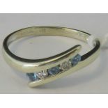 A 9ct gold diamond and aquamarine twist