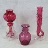 Three Victorian cranberry glass vases, t