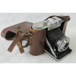 A collection of retro camera equipment w