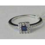 An 18ct white gold sapphire and diamond