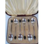 A boxed set of six HM silver coffee bean spoons, Birmingham 1925, maker TW&S.