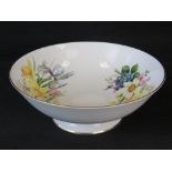 A Coalport fine china bowl with floral decoration inside and a gilt rim; 27cm diameter.