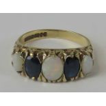 A 9ct gold five stone opal and sapphire ring,