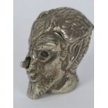 A silver vesta case in the form of a faun's head, brown glass eyes, stamped 925, 3.8cm high, 59.