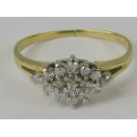 An 18ct gold and diamond cluster ring,