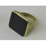 A 14ct gold onyx signet ring,