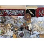 A quantity of costume jewellery including crystal bead necklaces, brooches, earrings,