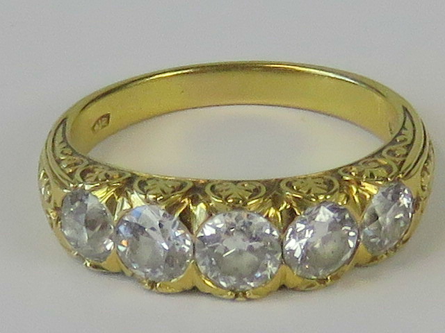 A five stone graduated diamond ring, approx 1.