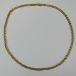 A 9ct double curb link chain, hallmarked 375, 46cm long, 6.