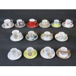 Fourteen late 20th century coffee cans and saucers with different designs and makers.