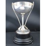 A HM silver golf trophy on wooden base, hallmarked London 1936,