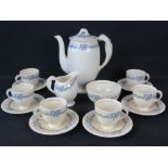 A New Hall coffee set with blue ribbon decoration: 6 cups and saucers, a milk jug and a sugar bowl.