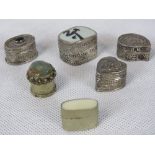 Two silver trinket boxes, one set with onyx cabachon and one heart shaped,