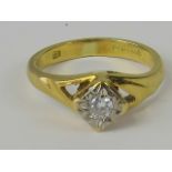 An 18ct gold diamond solitaire ring, illusion set diamond approx 0.