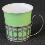 A Shelley bone china coffee can with silver sleeve hallmarked Birmingham 1945 made by Mappin and