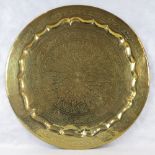 A heavy brass benares table top; 72.5cm diameter.