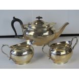 A HM silver tea service comprising teapot, milk jug and sugar bowl, all hallmarked Sheffield 1927,