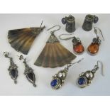 Five pairs of silver and white metal earrings; a pair of Stirling Siam niello bells,