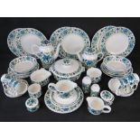 A large quantity of Midwinter tableware comprising teapot,milk, sugar, six cups, various plates,