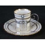 An Aynsley bone china coffee can and saucer with silver sleeve hallmarked Sheffield 1921 made by
