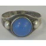 A Danish silver ring set with blue cabachon made by Brdr.