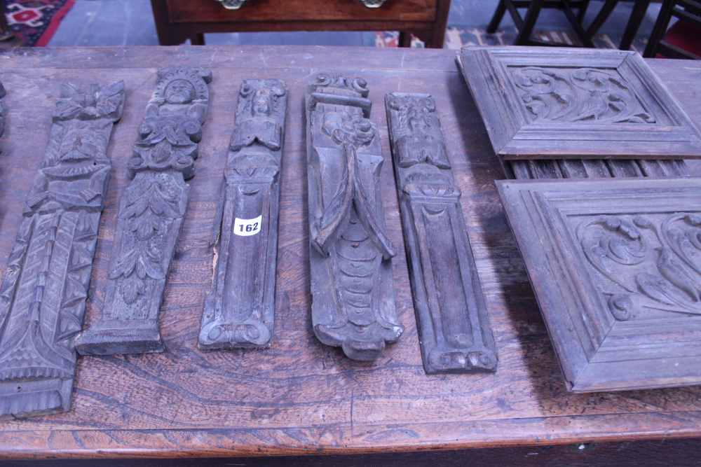 A GROUP OF VARIOUS 17TH AND 18TH.C.CARVED OAK ELEMENTS