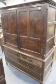 AN 18TH.C.OAK LINEN OR HALL CABINET