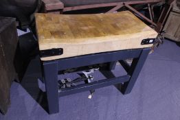 A LARGE BUTCHER'S BLOCK ON STAND