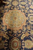 AN ANTIQUE SULTANABAD CARPET. 321 X 307 CMS