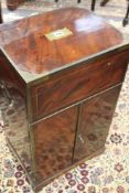 AN EARLY 19TH.C.MAHOGANY AND BRASS BOUND SILVER CABINET