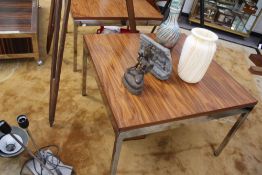 A PAIR OF CHROME AND ROSEWOOD KNOLL INTERNATIONAL LOW SIDE TABLES