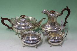 A SILVER FOUR PIECE TEA SET. DATED BIRMINGHAM 1923. WEIGHT 56OZS ALL IN