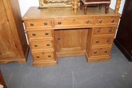 A LATE VICTORIAN PINE DESK