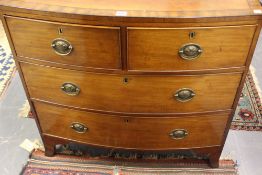 A SMALL EARLY 19TH.C.MAHOGANY BOW FRONT CHEST OF DRAWERS