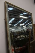 A LARGE VICTORIAN GALLERY MIRROR IN PAINTED FRAME
