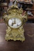 A VICTORIAN GILT BRASS ROCOCO STYLE STRIKING MANTLE CLOCK