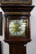 AN 18TH.C.OAK CASED 30 HOUR LONG CASE CLOCK WITH BRASS DIAL