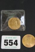 A VICTORIAN GOLD SOVEREIGN 1887. TOGETHER WITH A DUTCH 10 GUILDER GOLD COIN 1912