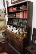 AN ARTS AND CRAFTS COTSWOLD SCHOOL OAK DRESSER