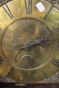 AN 18TH.C.OAK CASED LONG CASE CLOCK WITH BRASS DIAL SIGNED PLIMER, WELLINGTON.