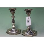 A PAIR OF SILVER CANDLESTICKS WITH TURNED COLUMNS. LONDON 1927. RETAILER WILSON & GILL REGENT STREET