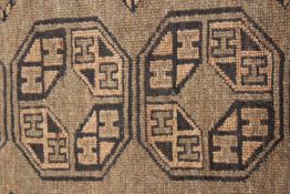 AN AFGHAN RUG AND ANOTHER OF HATCHLI DESIGN. LARGEST 208 X 106 CMS