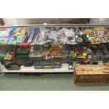 AN EXTENSIVE COLLECTION OF FISHING REELS, FLIES, LURES AND RELATED EQUIPMENT