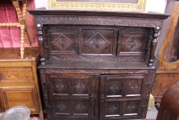 AN 18TH.C.OAK COURT CUPBOARD