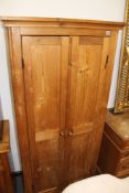 A PINE SMALL TWO DOOR HALL CABINET